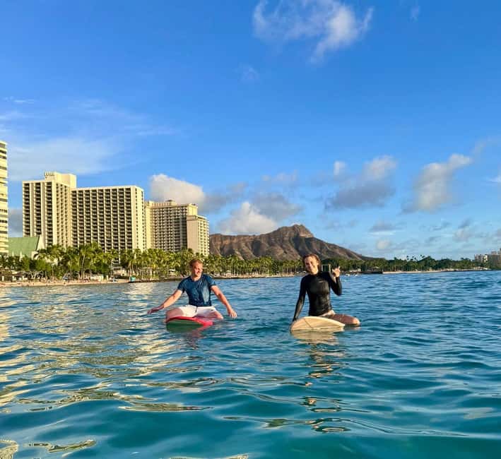 Oahu: Waikiki Beginner Private Surf Lesson- Female Guide - Learning on the sand before entering the water