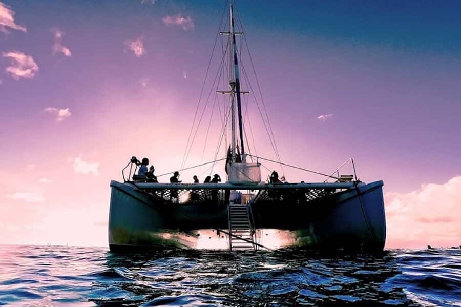 Oahu: Waikiki Sunset Catamaran Sail and Swim - Cruising toward Diamond Head at golden hour