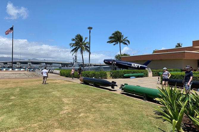Small Group-Oahu Tour, Dole Plantation, Northshore, Sunset Beach - Honolulu landmarks bring history into the drive